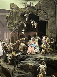 Detail einer Krippe mit heiliger Familie und Hirten